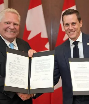 Premier Doug Ford and Premier Rob Lantz smile next to each other