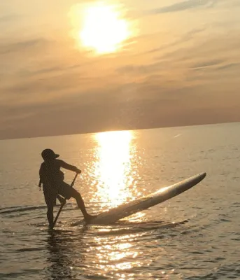 Matthew Doiron on a paddleboard Matthew Doiron on a paddleboard