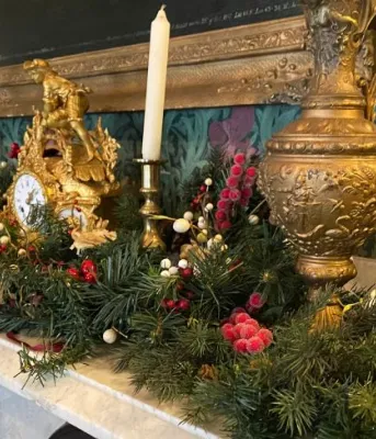 Victorian Christmas a step back in time image of christmas decorations and greenery on a fireplace mantle
