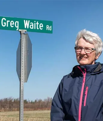 Minister Paula Bigger, Miriam Waite, wife of Greg Waite, David Linkletter, chair of the community council