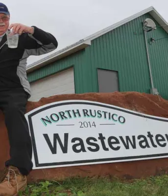 Les Standen Les Standen holds a clear glass of Rustico's treated wastewater